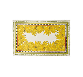 A rectangular tablecloth featuring a yellow banana print design with a cream background and a decorative border.