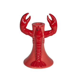 A glossy red lobster-shaped candle holder with raised claws and a small black eye detail, centered on a plain white background.